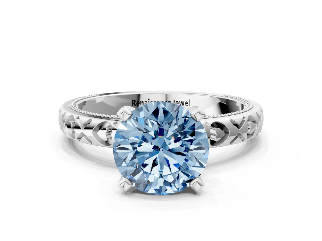 Platinum Fancy Blue Round  Solitaire Diamond Engagement Ring with XO Engraved Band and Four-Prong Setting