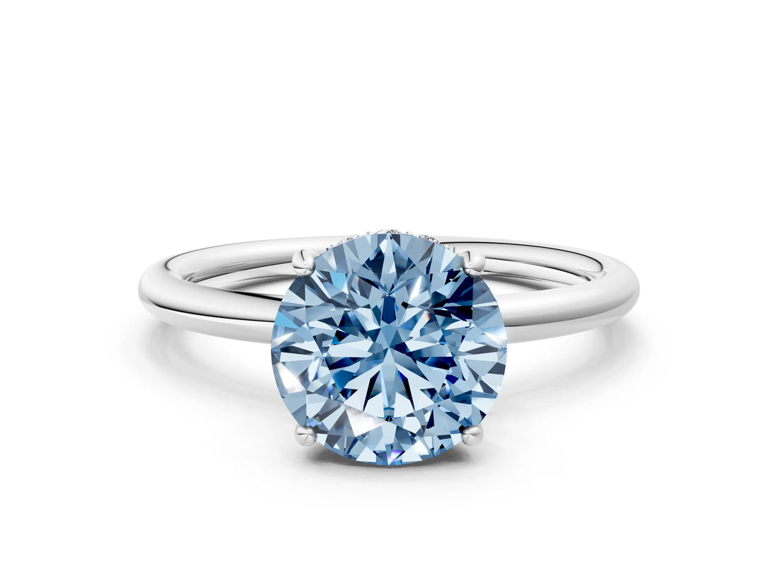 Platinum Fancy Blue Round  Solitaire Diamond Ring with a Classic Band and Four-Prong Setting