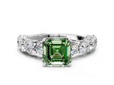 Platinum Fancy Green Asscher Cut Diamond Side Stone Engagement Ring with Four-Prong Setting