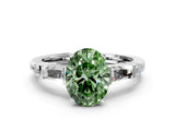 Platinum Fancy Green Oval  Cut Diamond Ring with Baguette Side Stones, Channel Set Band, and Four-Prong Setting_24