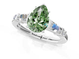 Platinum Fancy Green Pear  Cut Diamond Ring with Baguette Side Stones, Channel Set Band, and Four-Prong Setting_25