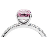 Platinum Fancy Pink Emerald Cut Diamond Pavé Solitaire Ring with Round Band and Prong Setting_4