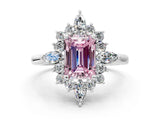Platinum Fancy Pink Emerald Cut Halo Diamond Cluster Ring with Marquise and Round Stones on a White Gold Band with Prong Setting