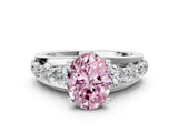 Platinum Fancy Pink Oval  Brilliant Solitaire with Side Stones on a Pave Band and Four-Prong Setting_12