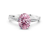 Platinum Fancy Pink Oval Cut Diamond Engagement Ring with Side Stone Accents and Four-Prong Setting