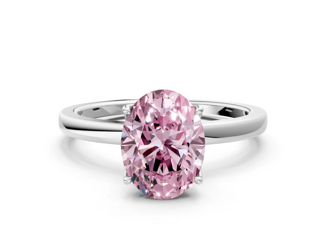 Platinum Fancy Pink Oval Cut Diamond Solitaire Ring with Thin Band and Prong Setting