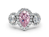 Platinum Fancy Pink Pear Cut Diamond Three-Stone Halo Ring with Prong Setting and Pavé Accents_12