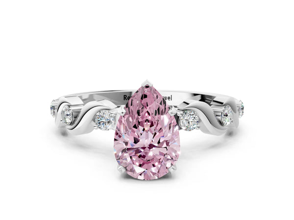 Platinum Fancy Pink Pear  Solitaire Twisted Band with Prong Setting