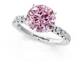 Platinum Fancy Pink Round Cut Diamond Solitaire Pavé Engagement Ring with Round Band and Prong Setting_1