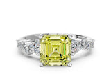 Platinum Fancy Yellow Asscher Cut Diamond Scattered Round Accent Ring with Prong Setting