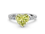 Platinum Fancy Yellow Heart Cut Diamond Pavé Solitaire Ring with Round Band and Prong Setting