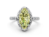 Platinum Fancy Yellow Marquise Cut Diamond Scalloped Halo Engagement Ring with Round Shared Prong Band