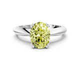 Platinum Fancy Yellow Oval  Cut Solitaire Engagement Ring with Tapered Band and Four-Prong Setting