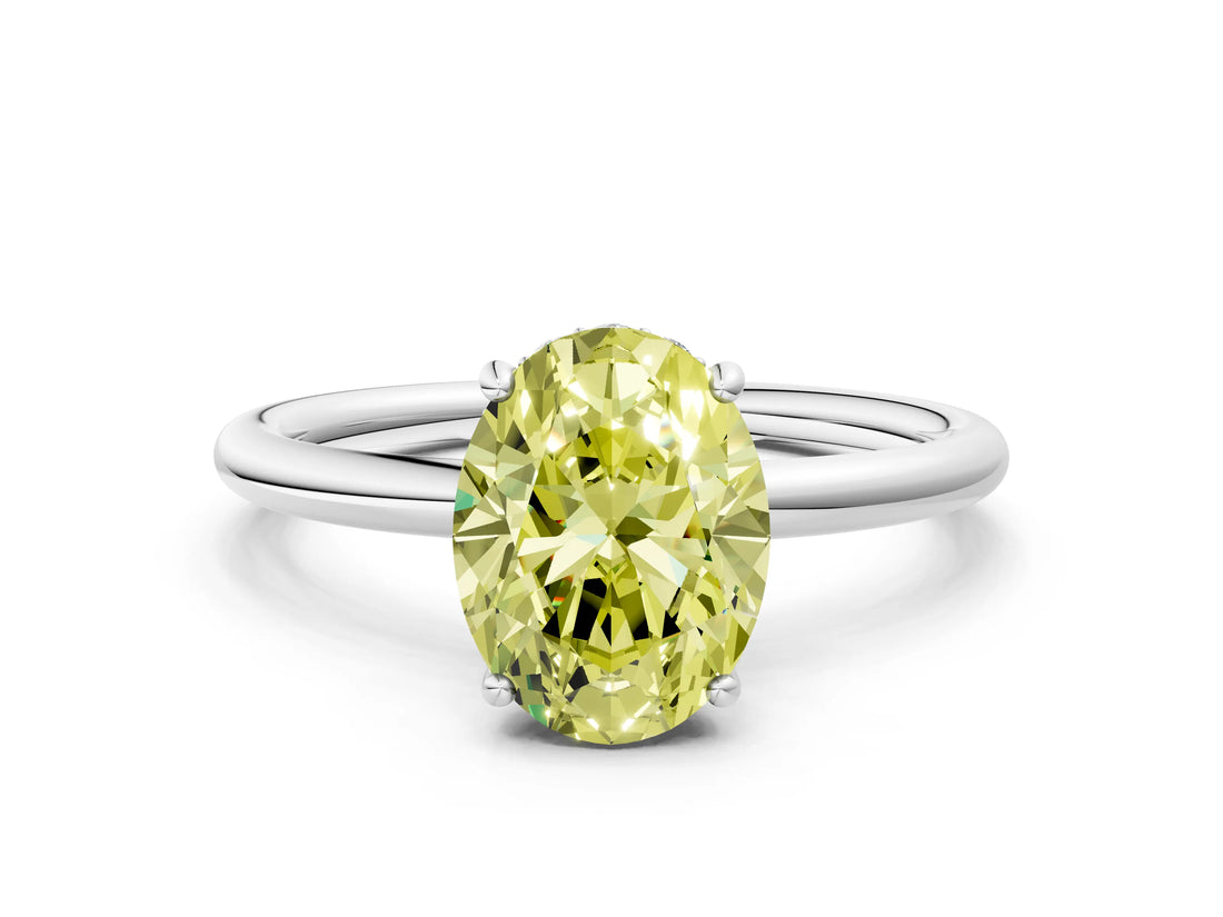 Platinum Fancy Yellow Oval  Solitaire Diamond Ring with a Classic Band and Four-Prong Setting