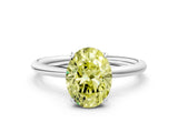 Platinum Fancy Yellow Oval  Solitaire Diamond Ring with a Classic Band and Four-Prong Setting