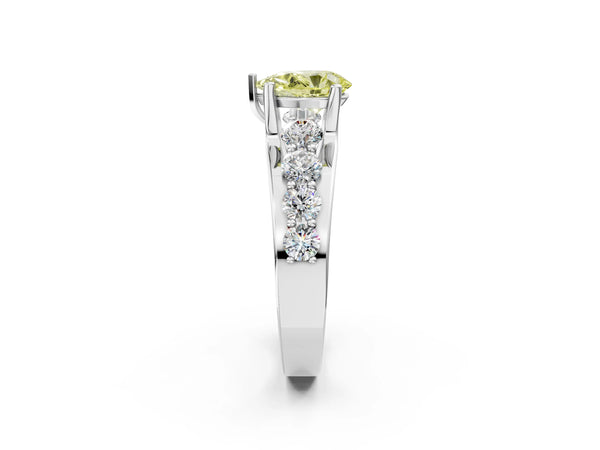 Platinum Fancy Yellow Pear  Brilliant Solitaire with Side Stones on a Pave Band and Four-Prong Setting