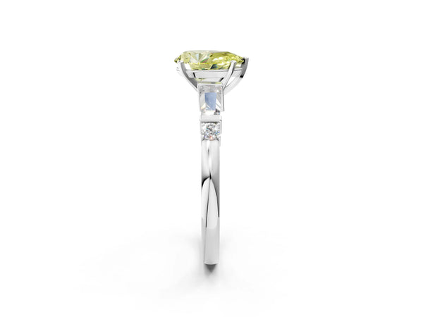 Platinum Fancy Yellow Pear  Cut Diamond Ring with Baguette Side Stones, Channel Set Band, and Four-Prong Setting