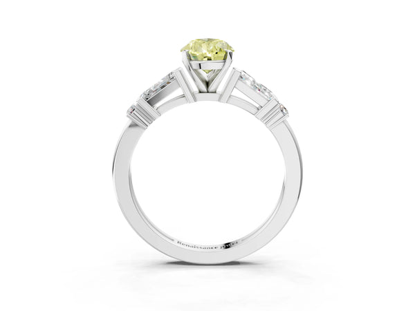 Platinum Fancy Yellow Pear  Cut Diamond Ring with Baguette Side Stones, Channel Set Band, and Four-Prong Setting
