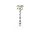 Platinum Fancy Yellow Pear Cut Solitaire Diamond Ring with Infinity Twist Band and Four-Prong Setting_8