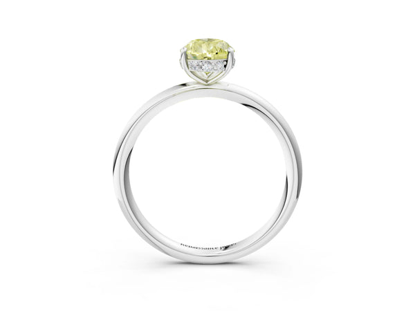 Platinum Fancy Yellow Pear  Solitaire Diamond Ring with a Classic Band and Four-Prong Setting
