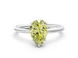 Platinum Fancy Yellow Pear  Solitaire Diamond Ring with a Classic Band and Four-Prong Setting