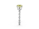 Platinum Fancy Yellow Round Cut Solitaire Diamond Ring with Infinity Twist Band and Four-Prong Setting_14