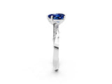 Platinum Heart Cut Blue Sapphire Engagement Ring with Side Stone Accents and Four-Prong Setting_14