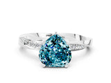 Platinum Heart Cut Blue Topaz Engagement Ring with Side Stone Accents and Four-Prong Setting_12