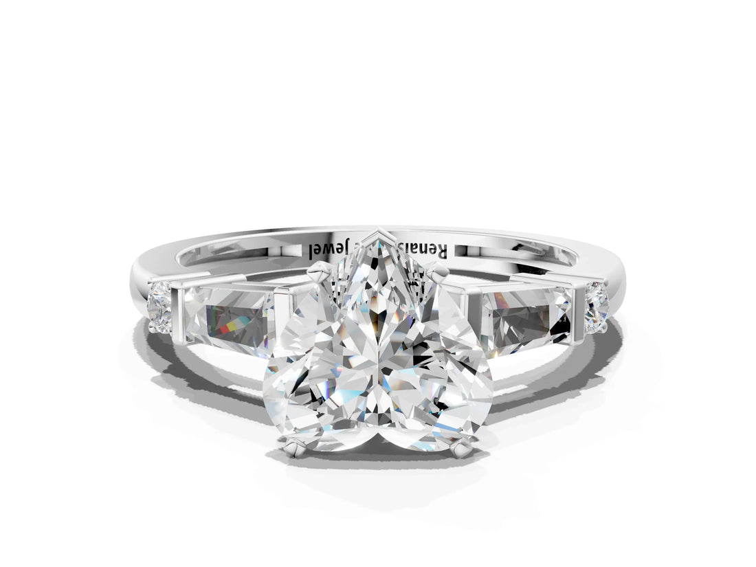Platinum Heart Cut Diamond Ring with Baguette Side Stones, Channel Set Band, and Four-Prong Setting_13