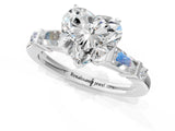 Platinum Heart Cut Diamond Ring with Baguette Side Stones, Channel Set Band, and Four-Prong Setting_14