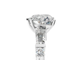 Platinum Heart Cut Diamond Ring with Baguette Side Stones, Channel Set Band, and Four-Prong Setting_18
