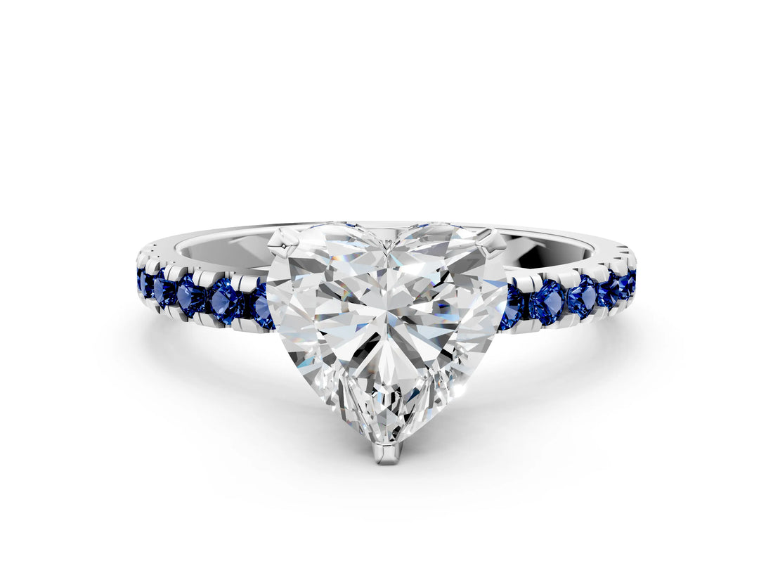 Platinum Heart Cut Diamond Solitaire Ring with Round with Blue Sapphire side stone Pavé Band and Four-Prong Setting_12