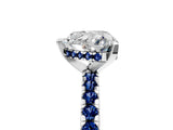 Platinum Heart Cut Diamond Solitaire Ring with Round with Blue Sapphire side stone Pavé Band and Four-Prong Setting_17