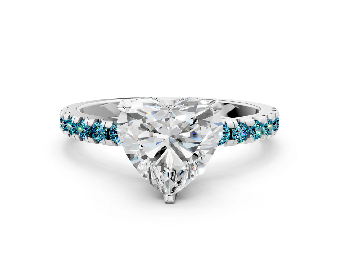 Platinum Heart Cut Diamond Solitaire Ring with Round with Blue Topaz side stone Pavé Band and Four-Prong Setting_12