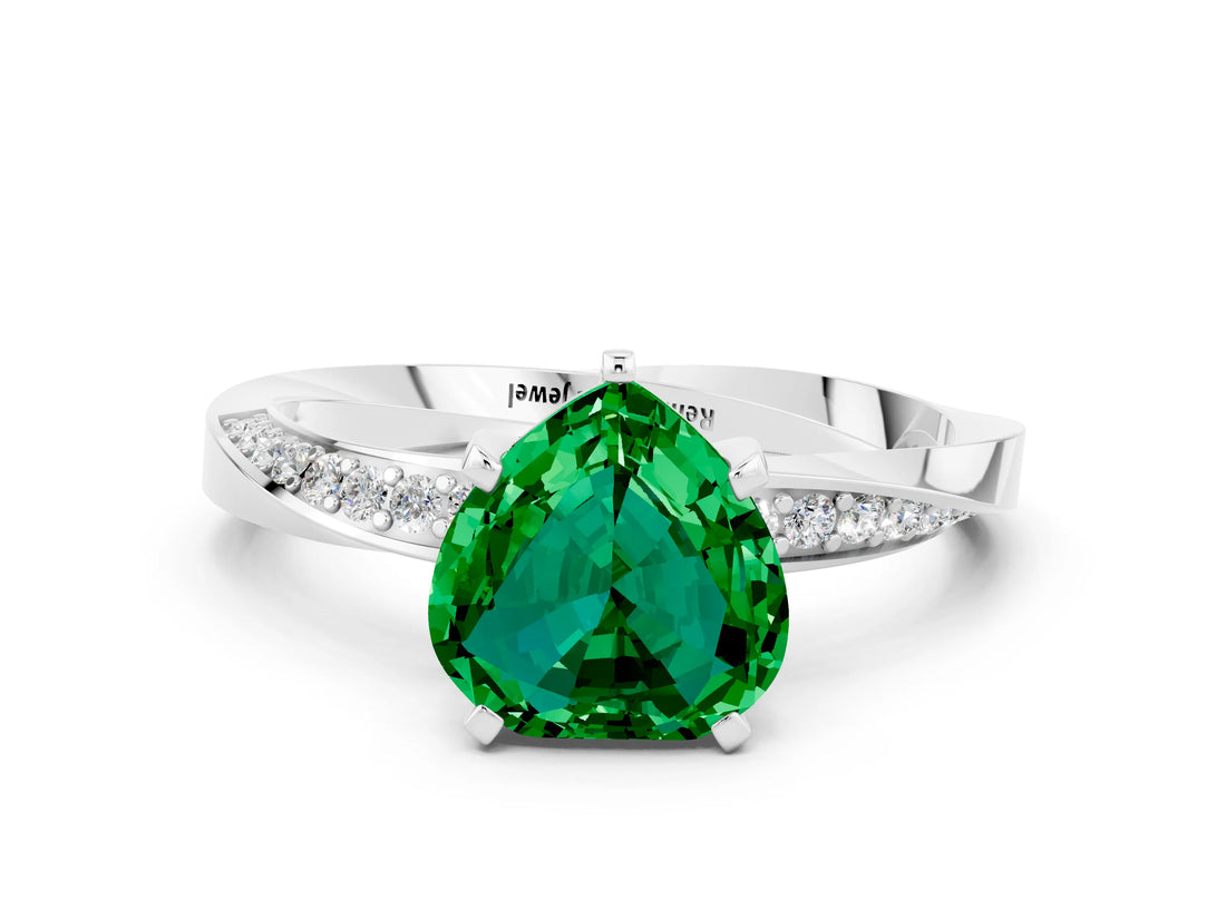 Platinum Heart Cut Emerald Engagement Ring with Side Stone Accents and Four-Prong Setting_12