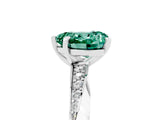 Platinum Heart Cut Green Sapphire Engagement Ring with Side Stone Accents and Four-Prong Setting_17