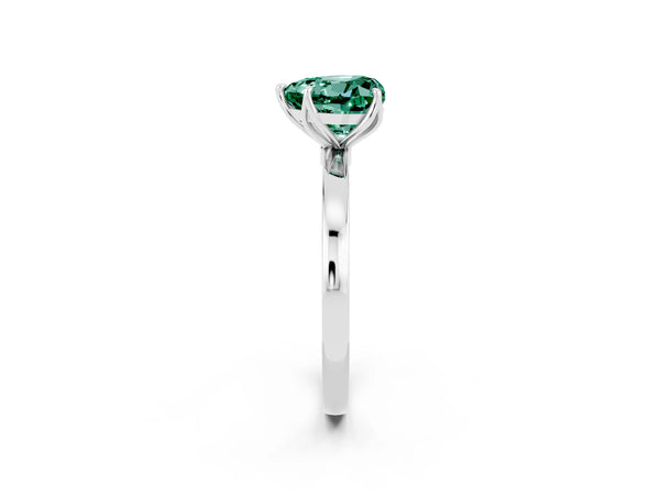 Platinum Heart Cut Green Sapphire Solitaire Ring with Thin Band and Prong Setting