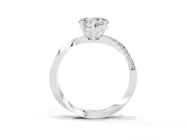 Platinum Heart Cut Moissanite Engagement Ring with Side Stone Accents and Four-Prong Setting