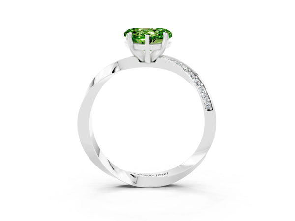 Platinum Heart Cut Peridot Engagement Ring with Side Stone Accents and Four-Prong Setting
