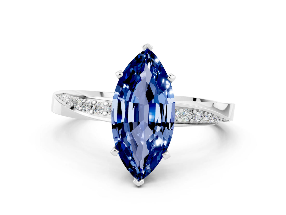Platinum Marquise Cut Blue Sapphire Engagement Ring with Side Stone Accents and Four-Prong Setting_24