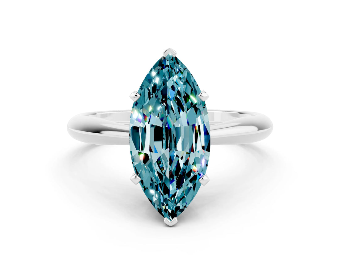 Platinum Marquise Cut Blue Topaz Solitaire Engagement Ring with Cathedral Setting and Four-Prong Mount