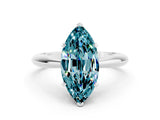 Platinum Marquise Cut Blue Topaz Solitaire Engagement Ring with Cathedral Setting and Four-Prong Mount