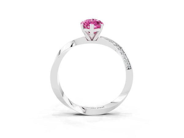 Platinum Marquise Cut Pink Sapphire Engagement Ring with Side Stone Accents and Four-Prong Setting