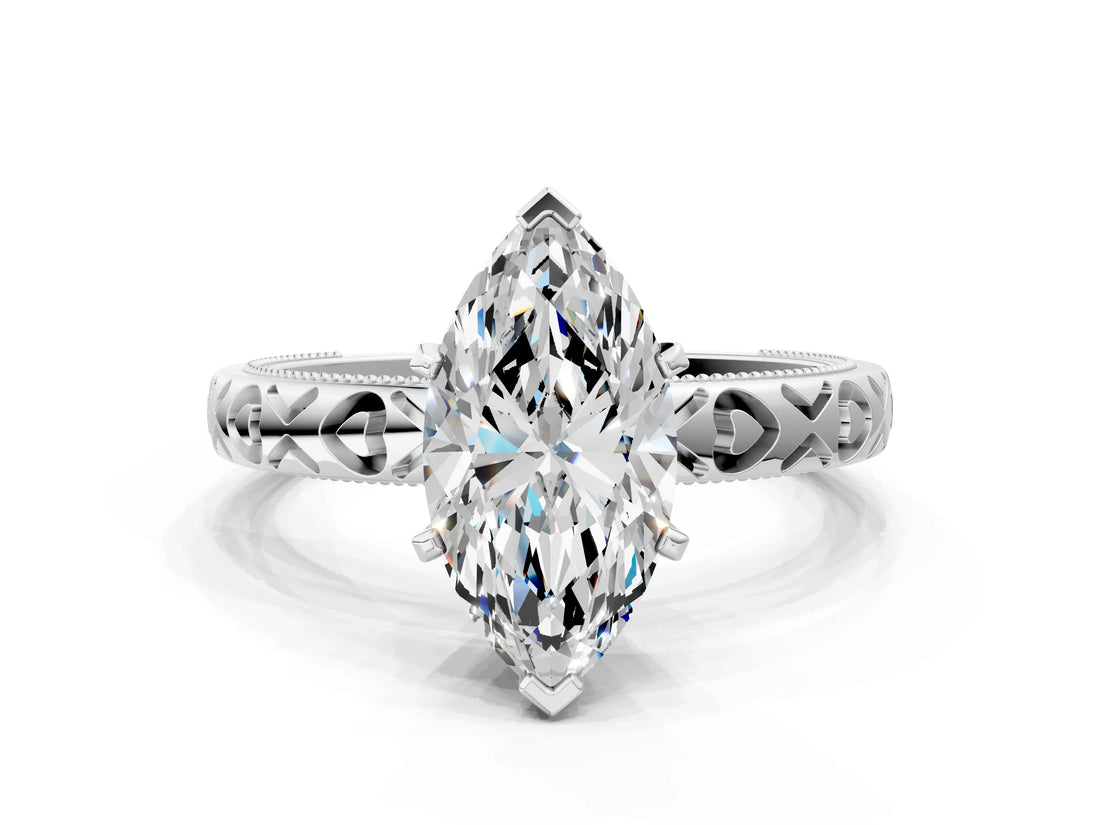 Platinum Marquise Solitaire Diamond Engagement Ring with XO Engraved Band and Four-Prong Setting