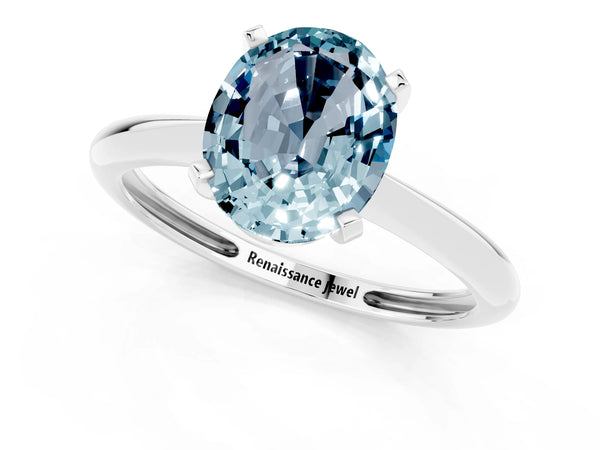 Platinum Oval Cut Aquamarine Solitaire Engagement Ring with Classic Band and Four-Prong Setting