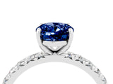 Platinum Oval Cut Blue Sapphire Pavé Solitaire Ring with Round Band and Prong Setting_52