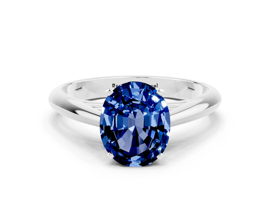Platinum Oval Cut Blue Sapphire Solitaire Engagement Ring with Cathedral Setting and Four-Prong Mount_12