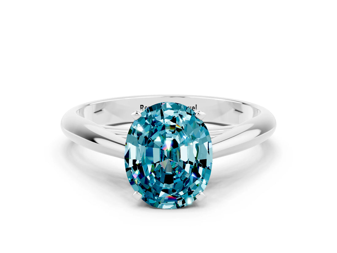 Platinum Oval Cut Blue Topaz Solitaire Engagement Ring with Cathedral Setting and Four-Prong Mount_12