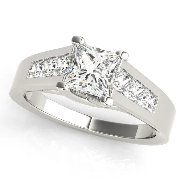 Platinum Oval Cut Channel Set Solitaire Ring with Four-Prong Setting