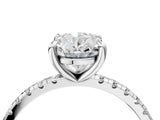 Platinum Oval Cut Diamond Brilliant Solitaire Ring with Pavé Band and Four-Prong Setting_24